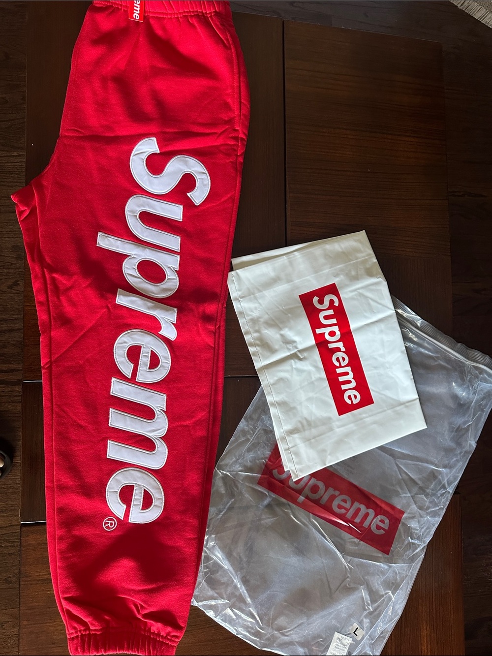 Supreme Red Sweatpants with White Logo